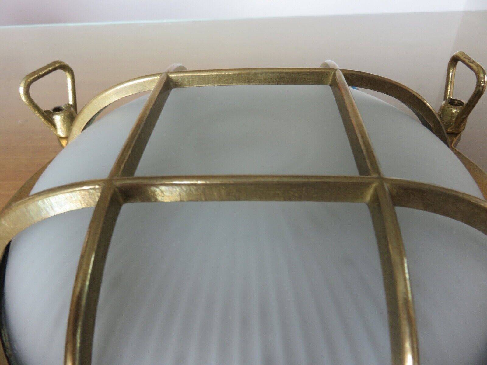 Brass porthole wall lamp