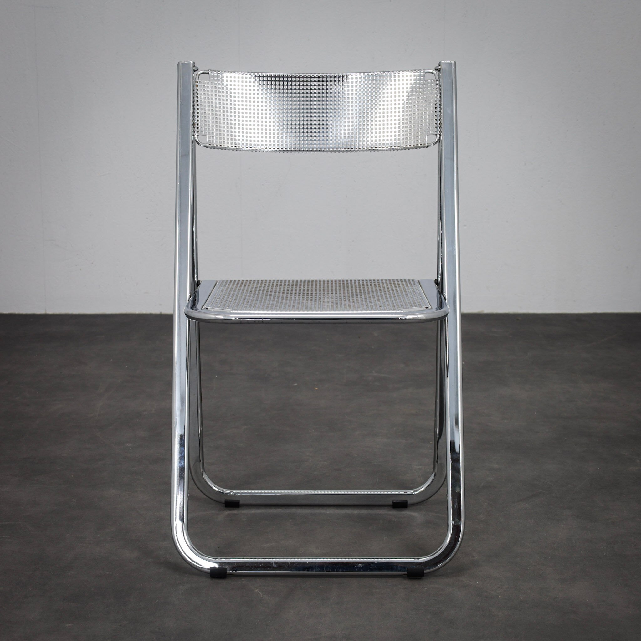 "Tamara" perforated metal folding chair by Arrben Italy (1980s)