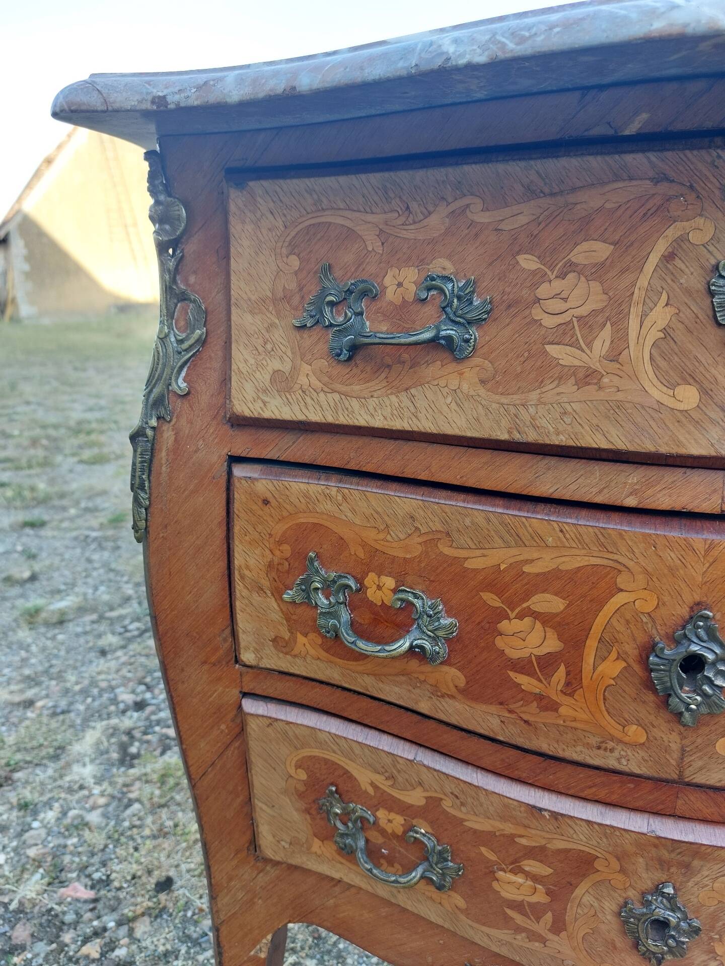 Curved commode in rosewood, Louis XV style.