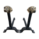 Pair of metal chenets decorated with brass dog heads