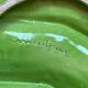 Green slipware asparagus dish