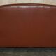 Edwardian leather club canapé circa 1910 with feather cushions.