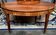 Empire style table. Rosewood veneer, bronze.