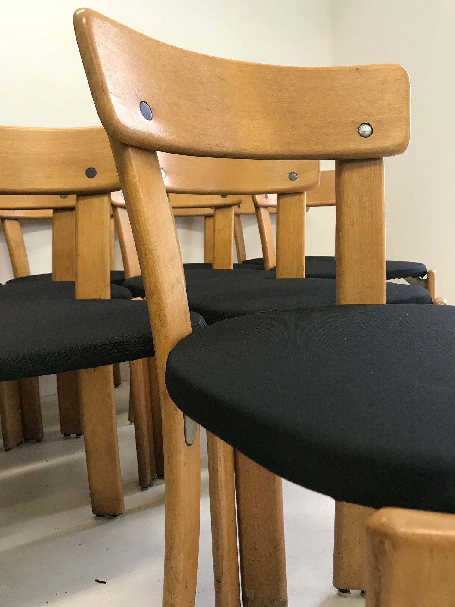 Designer Bruno Rey's suite of 12 chairs