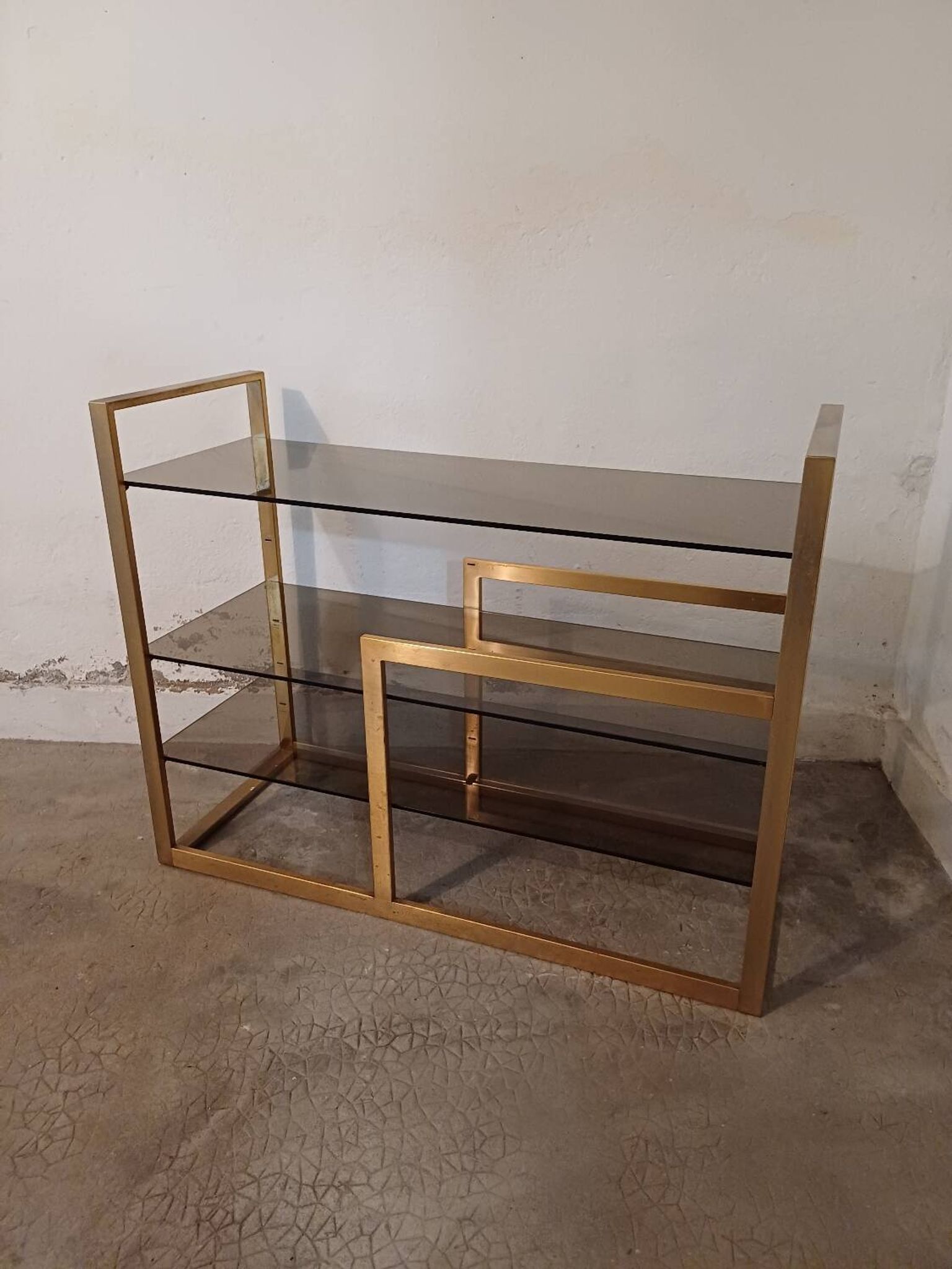 Brass shelf, smoked glass