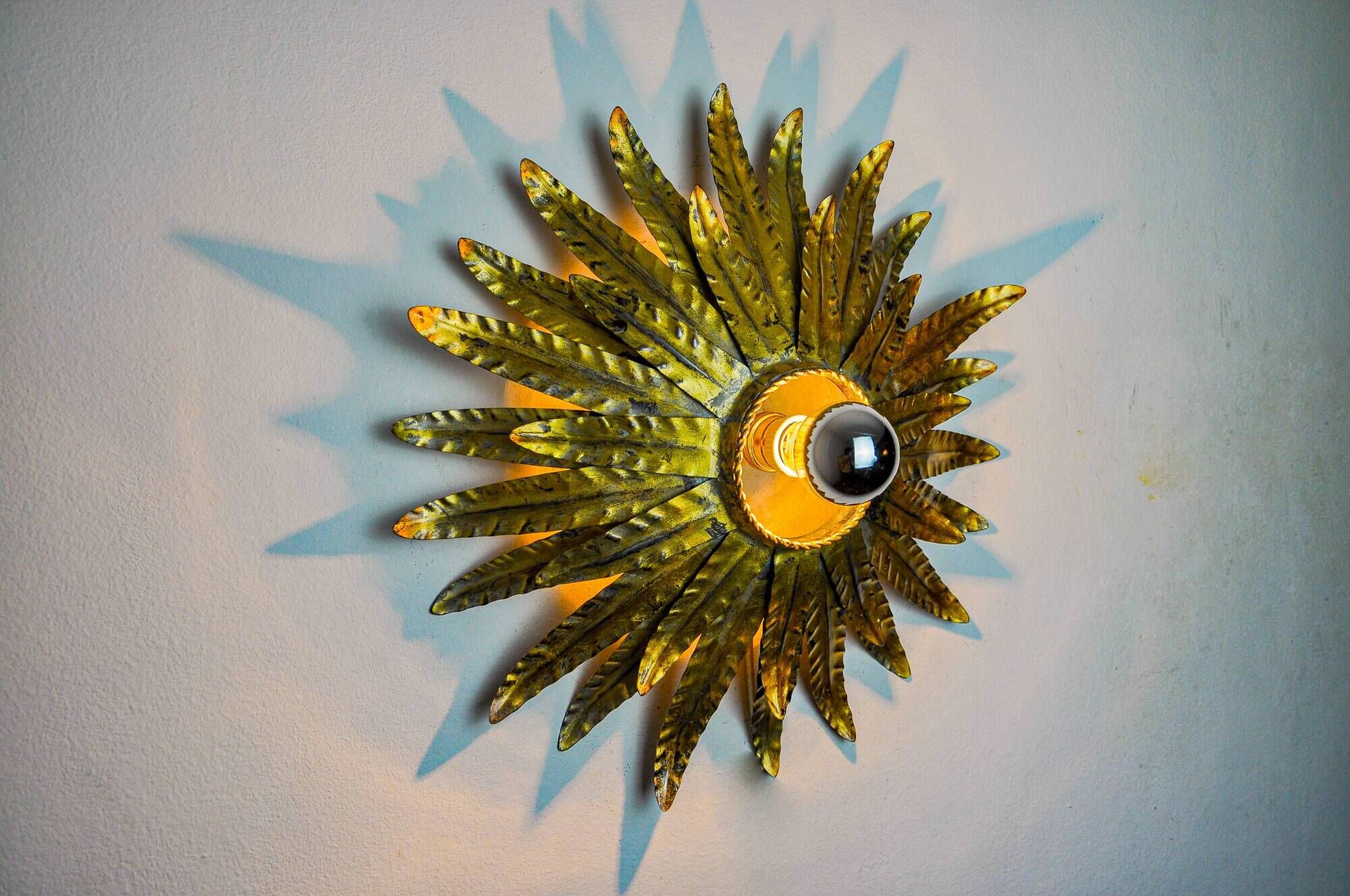 Sun wall lamp by Ferro Arte, metal and gold leaf, Spain 1970