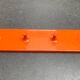 Orange coat rack from the mid-century space age, 1960s.