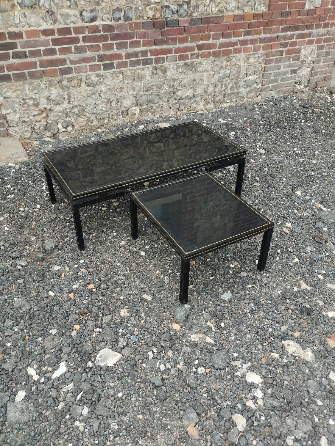 Vintage metal coffee table with glass top.
