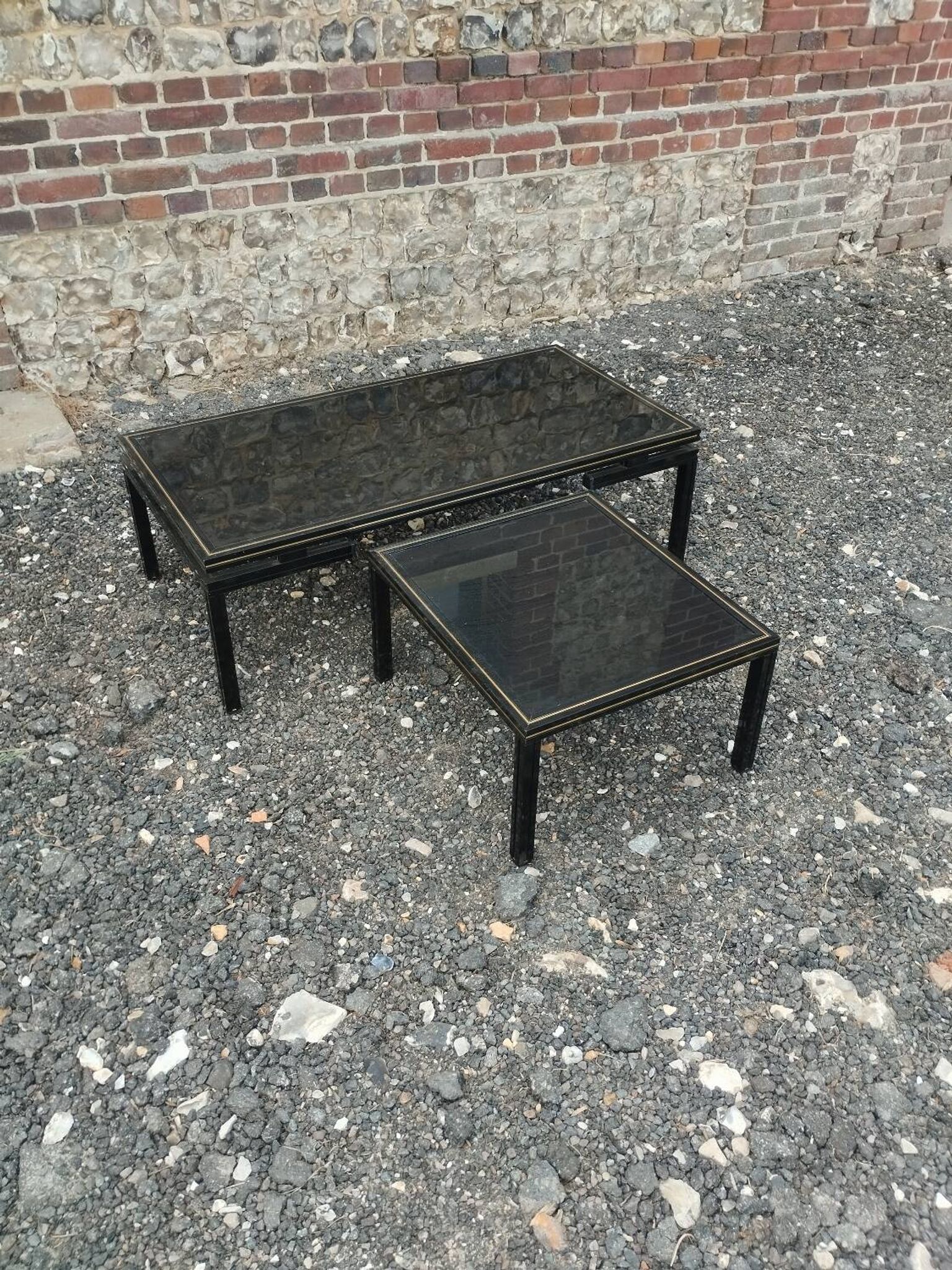 Vintage metal coffee table with glass top.