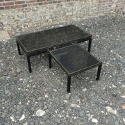 Vintage metal coffee table with glass top.