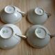 4 cups with 4 saucers Limoges, fine porcelain, coffee cups, white, light green, gold