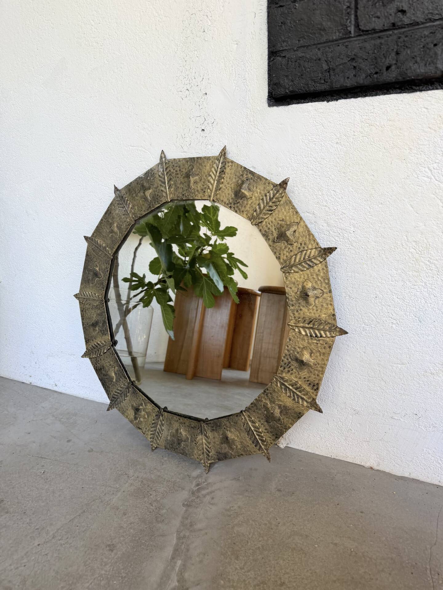 Brutalist round hammered gold metal mirror