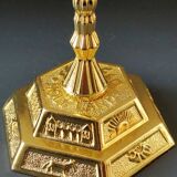 Menorah/Jewish/Hebrew candlestick with 7 arms of light. Engraved with the symbols of the 12 tribes of Israel/Holyland inscription. In gold metal. Size 20 x 16 cm