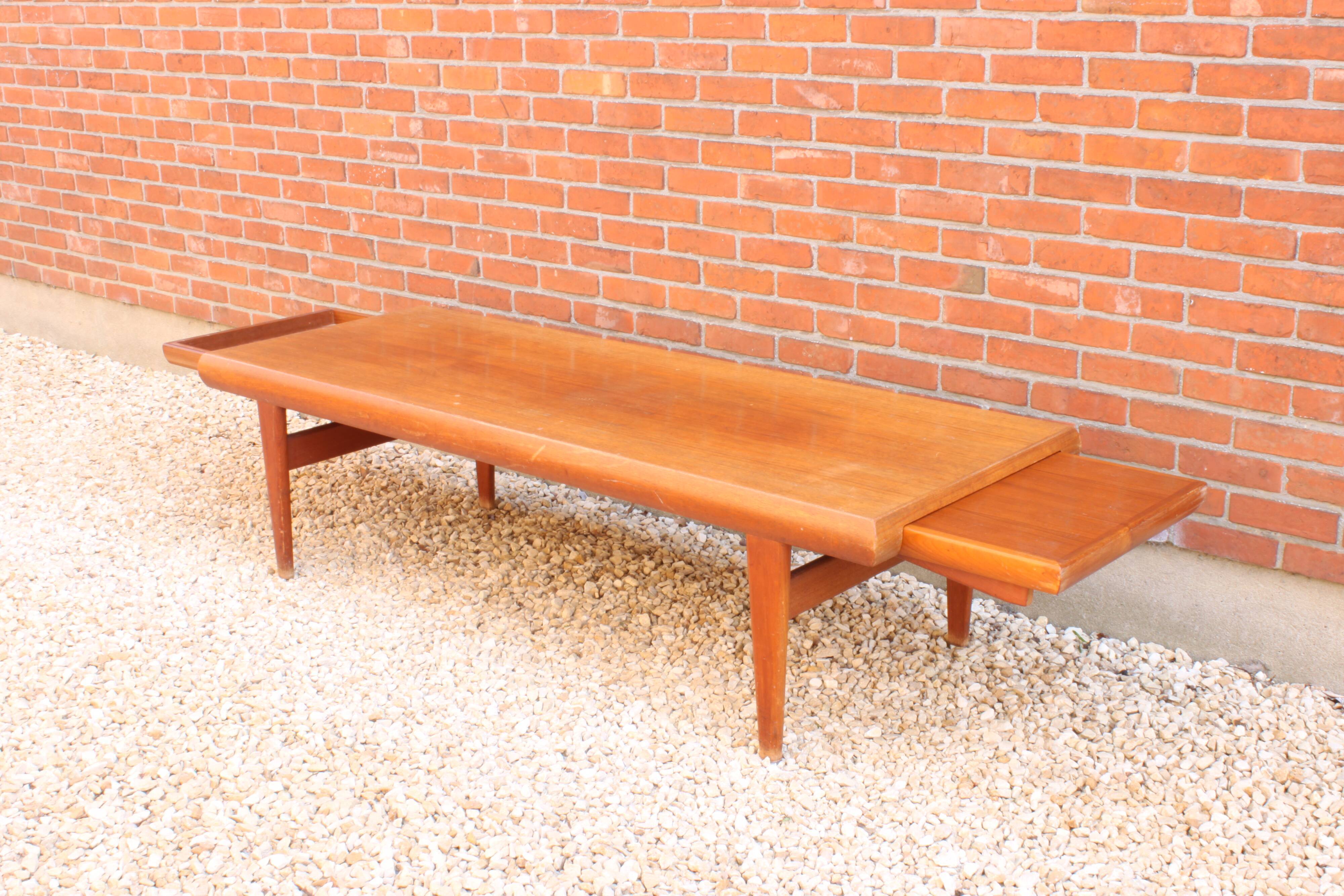 Danish teak wooden coffee table with hidden compartments, by Johannes Andersen for Trioh
