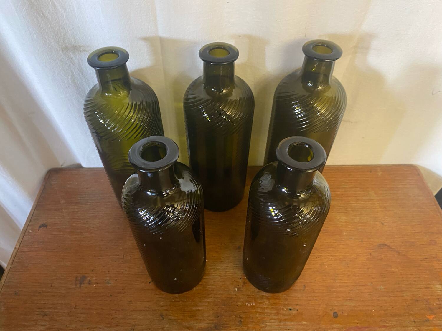 Set of 5 antique carapelli bottles, smoked and ribbed vintage glass