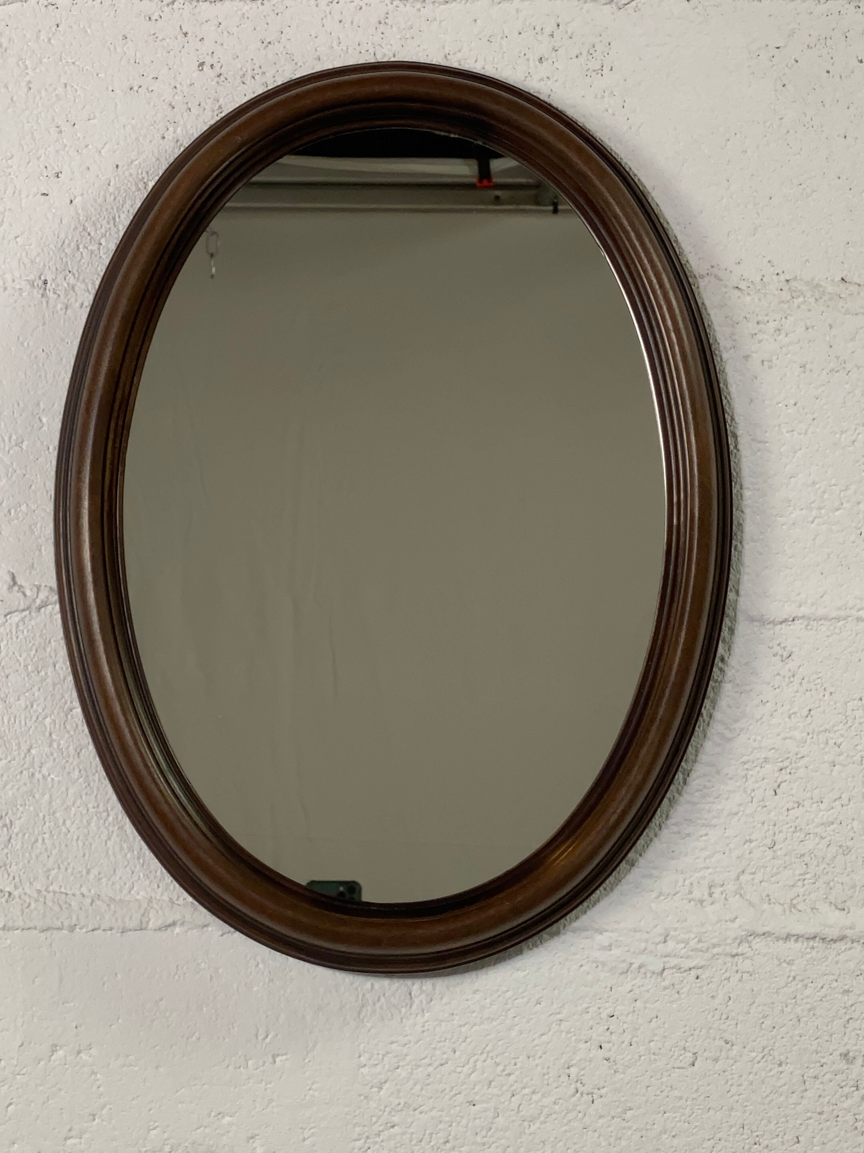 Oval wooden mirror
