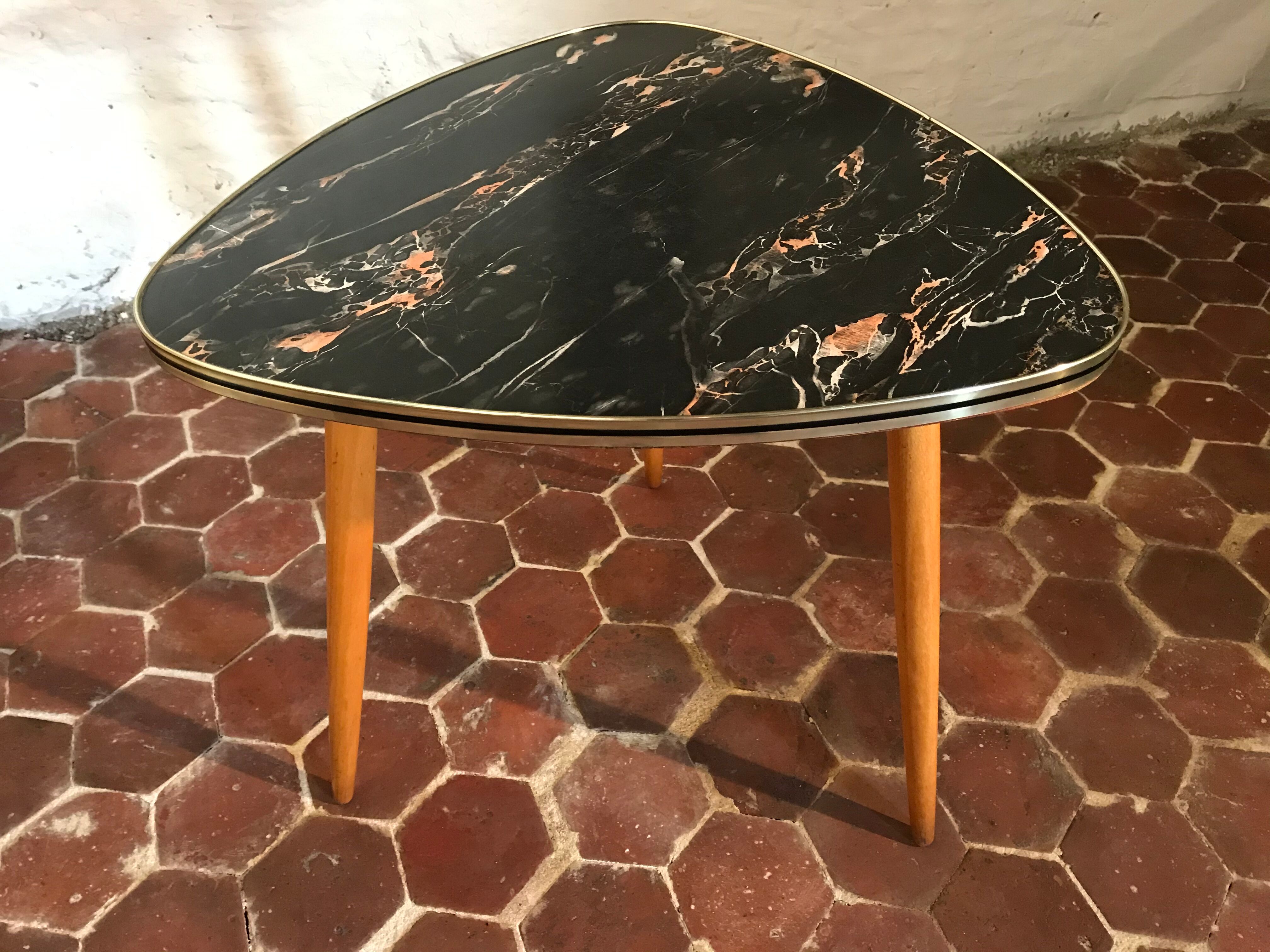 Free-form tripod coffee table