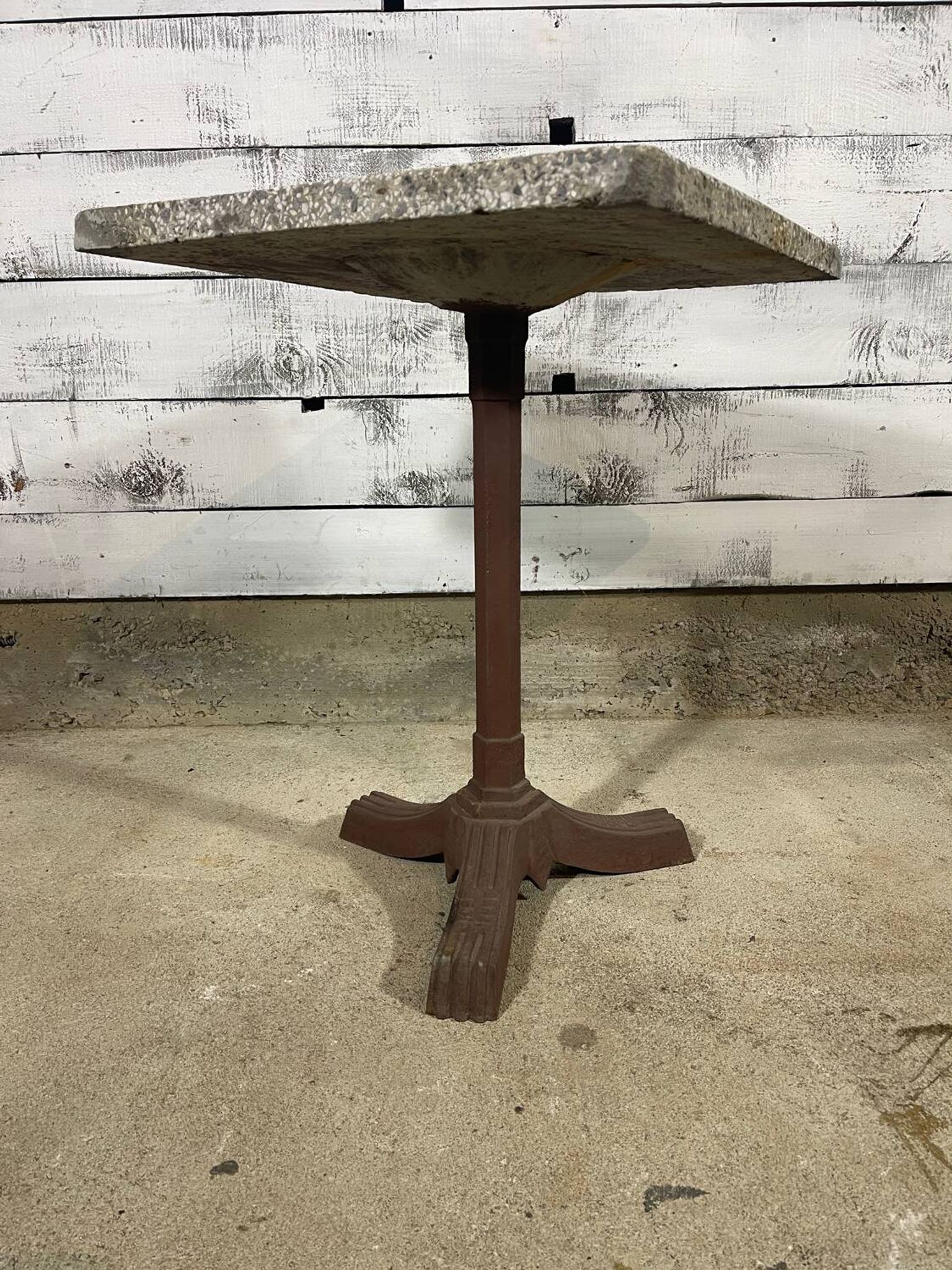 Bistro table with a cast iron base