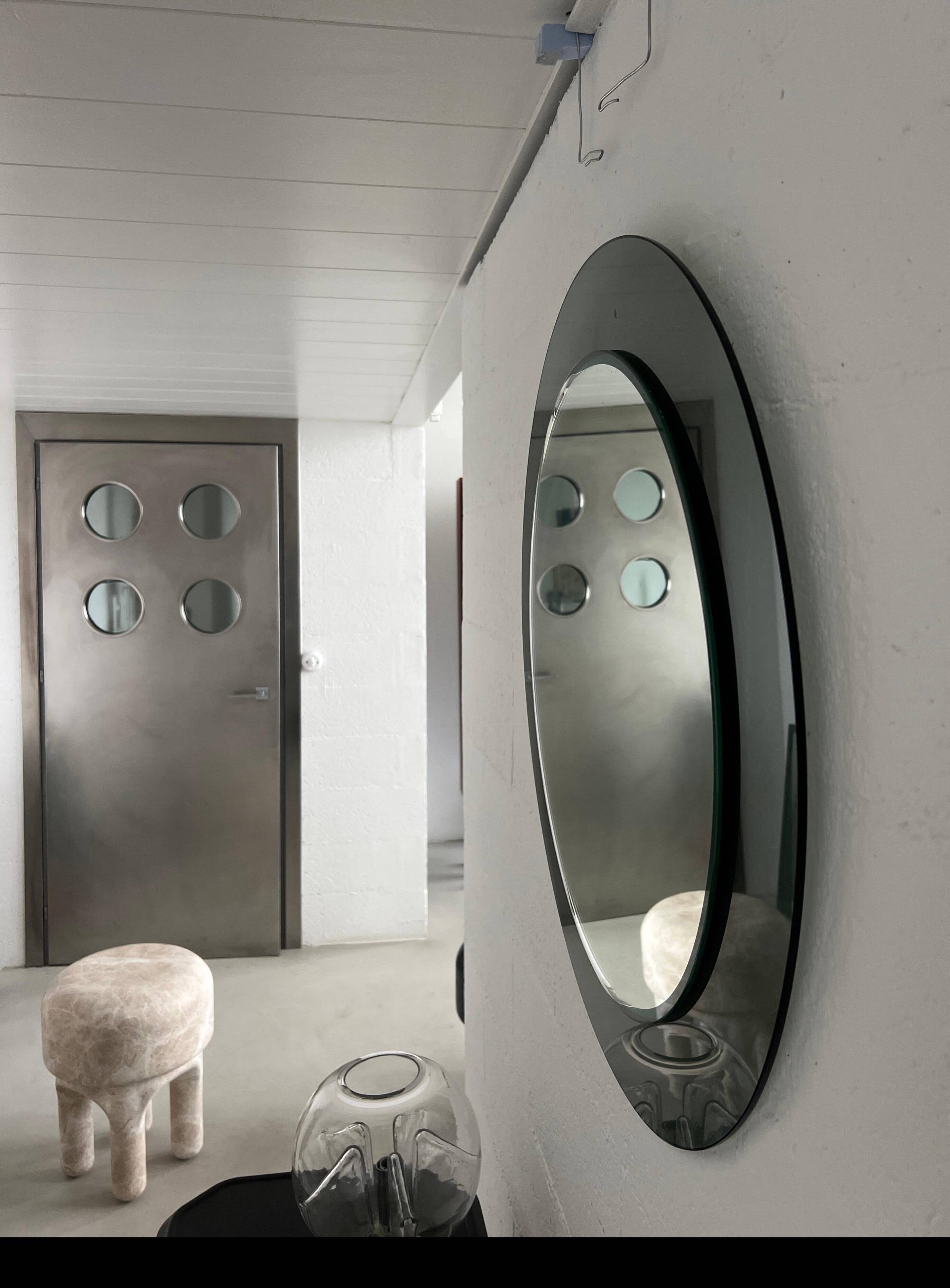 Decorative round wall mirror in smoked glass, Space Age Italian collectible