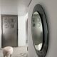 Decorative round wall mirror in smoked glass, Space Age Italian collectible