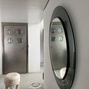 Decorative round wall mirror in smoked glass, Space Age Italian collectible