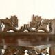Carved wooden wall shelf