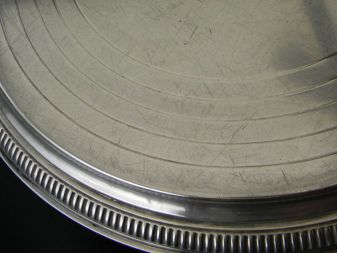 Silver-plated trivet.