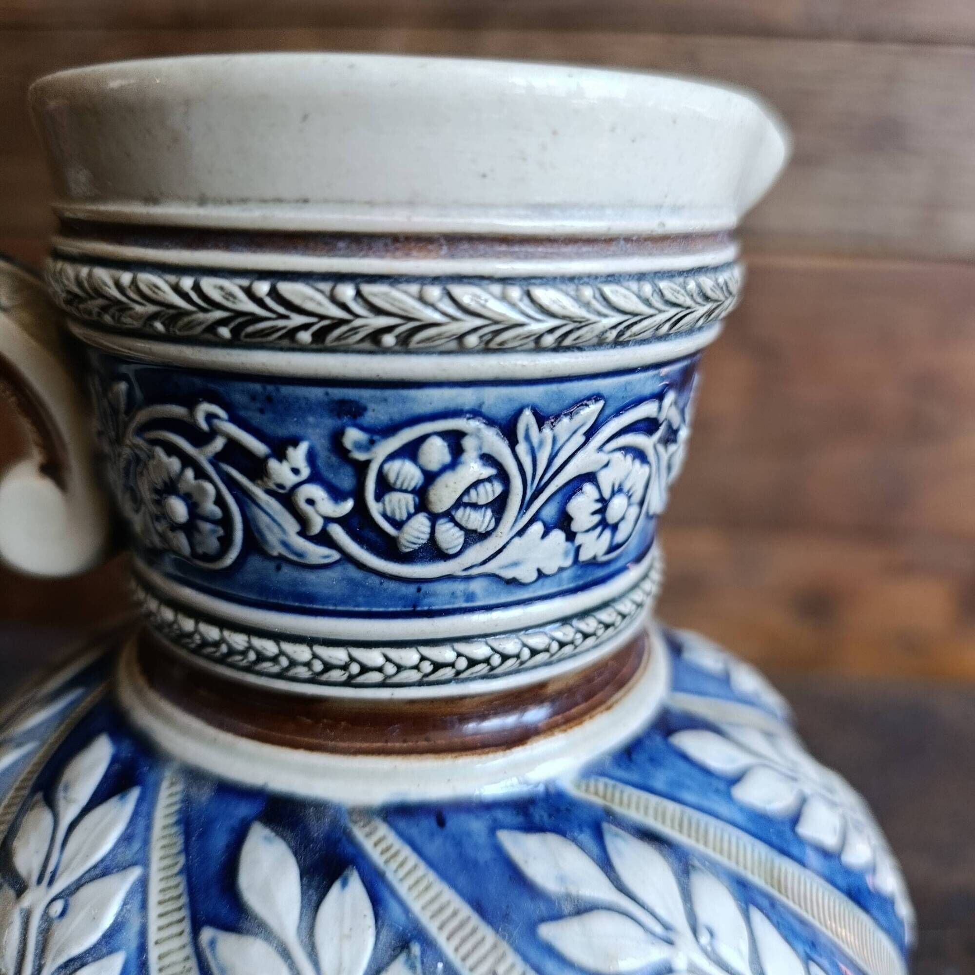 Vintage German Westerwald stoneware jug with cobalt blue floral relief