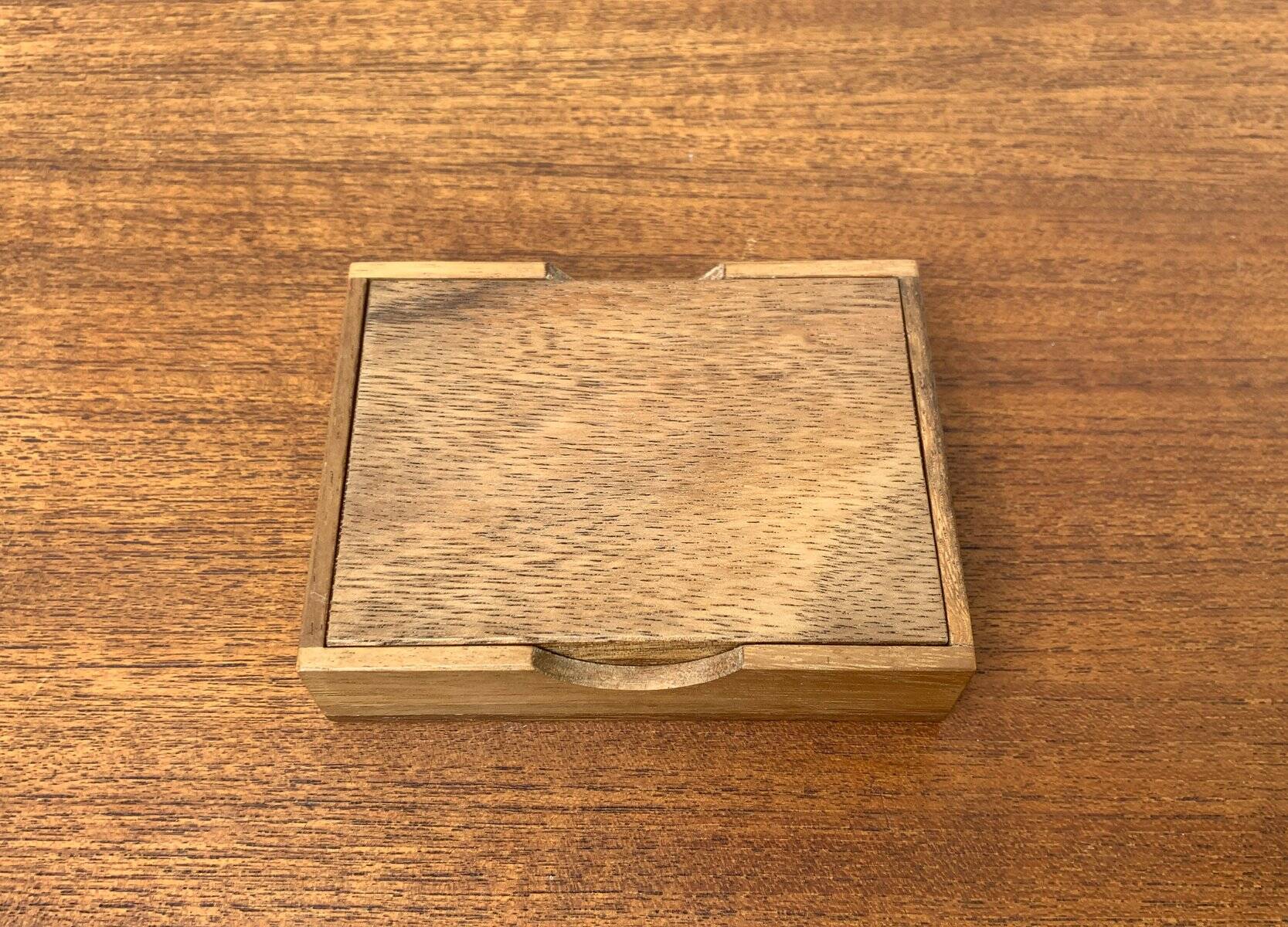 Mid-century Scandinavian teak dice game from the 1960s.