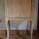 Wood and pink bedside table