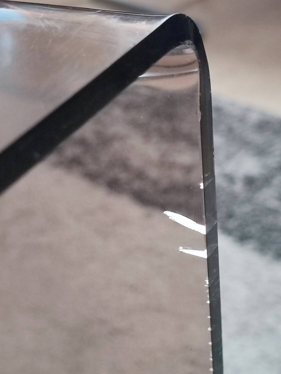 Michel Dumas smoked Plexiglas rolling table.