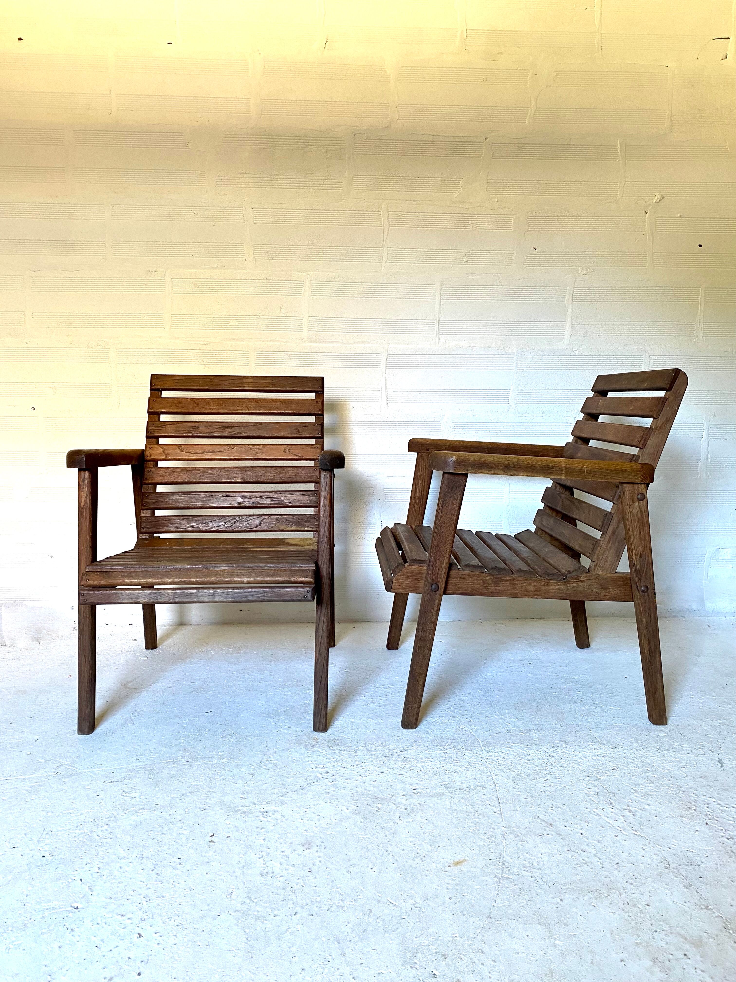 pair of armchairs with slats in chene 1950