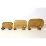 Ensemble de trois éléphants en bois à roulette