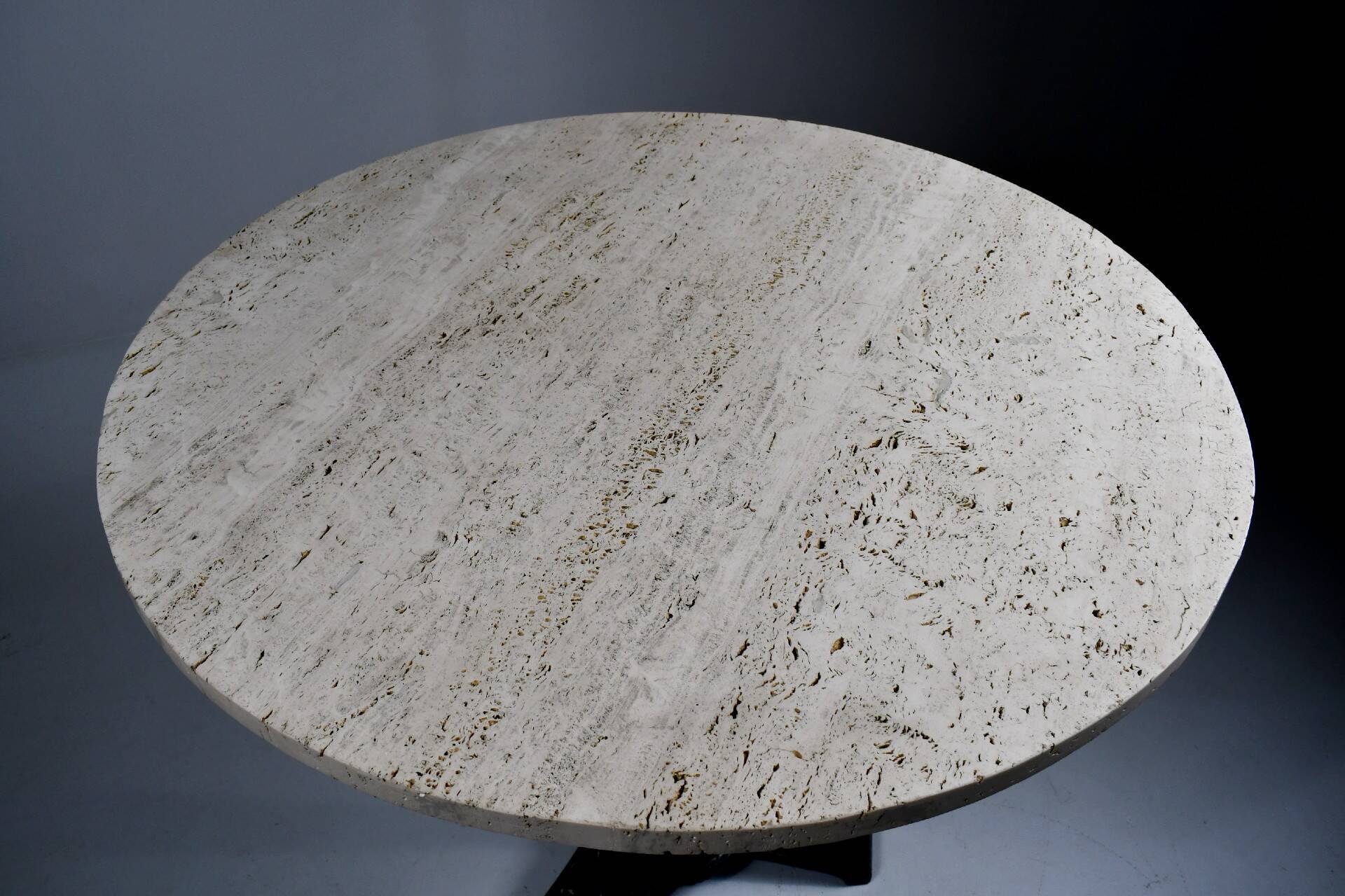 Vintage travertine bistro/dining table with metal base. (B)