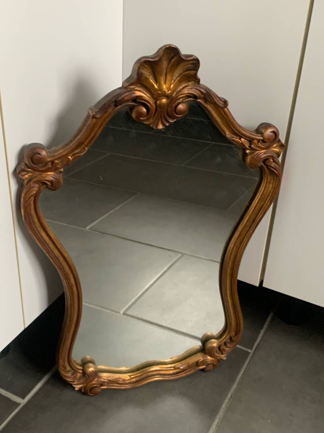 Baroque mirror in gilded wood from the 50s