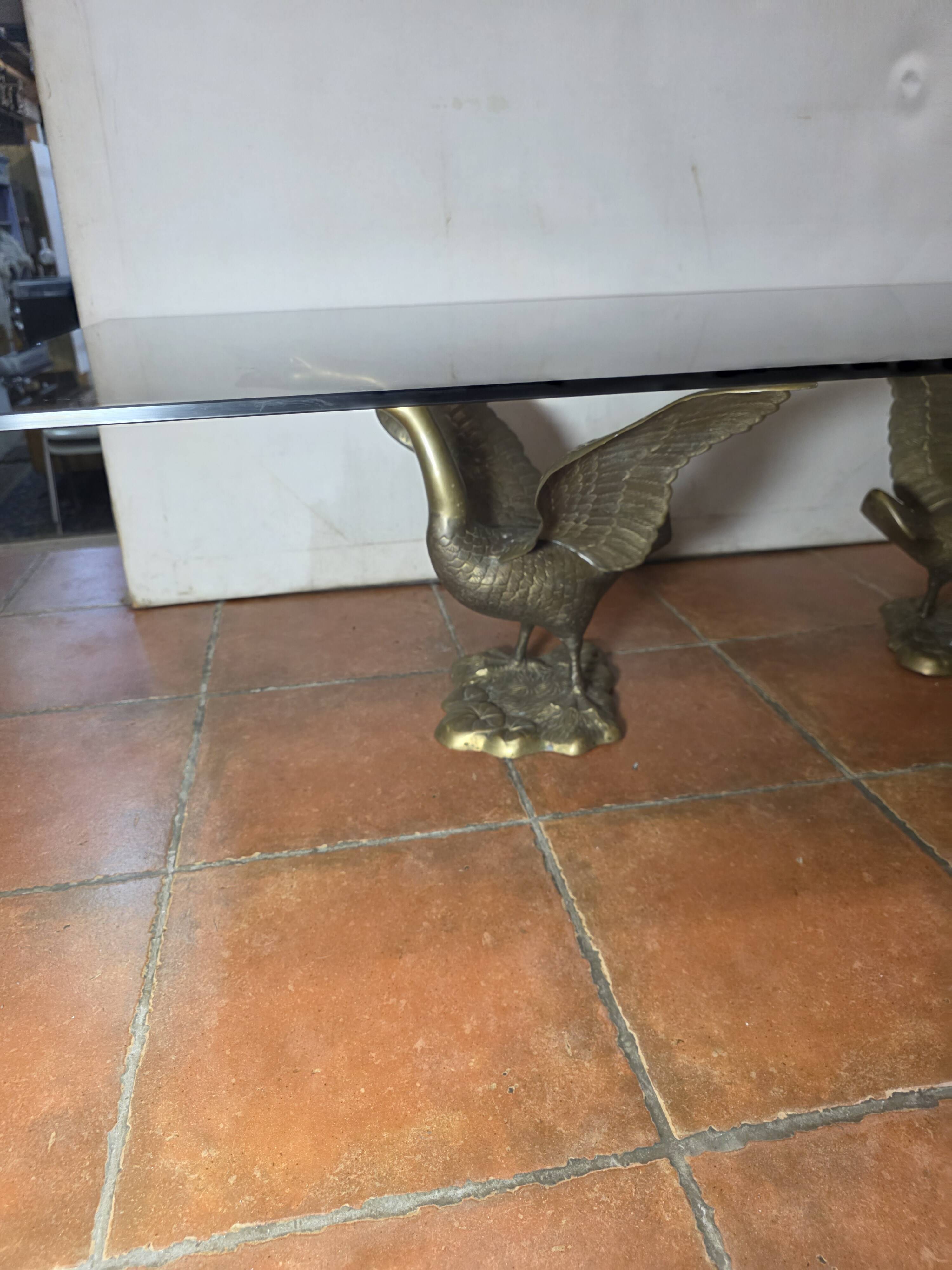 Vintage brass goose coffee table with smoked glass, 1970s.