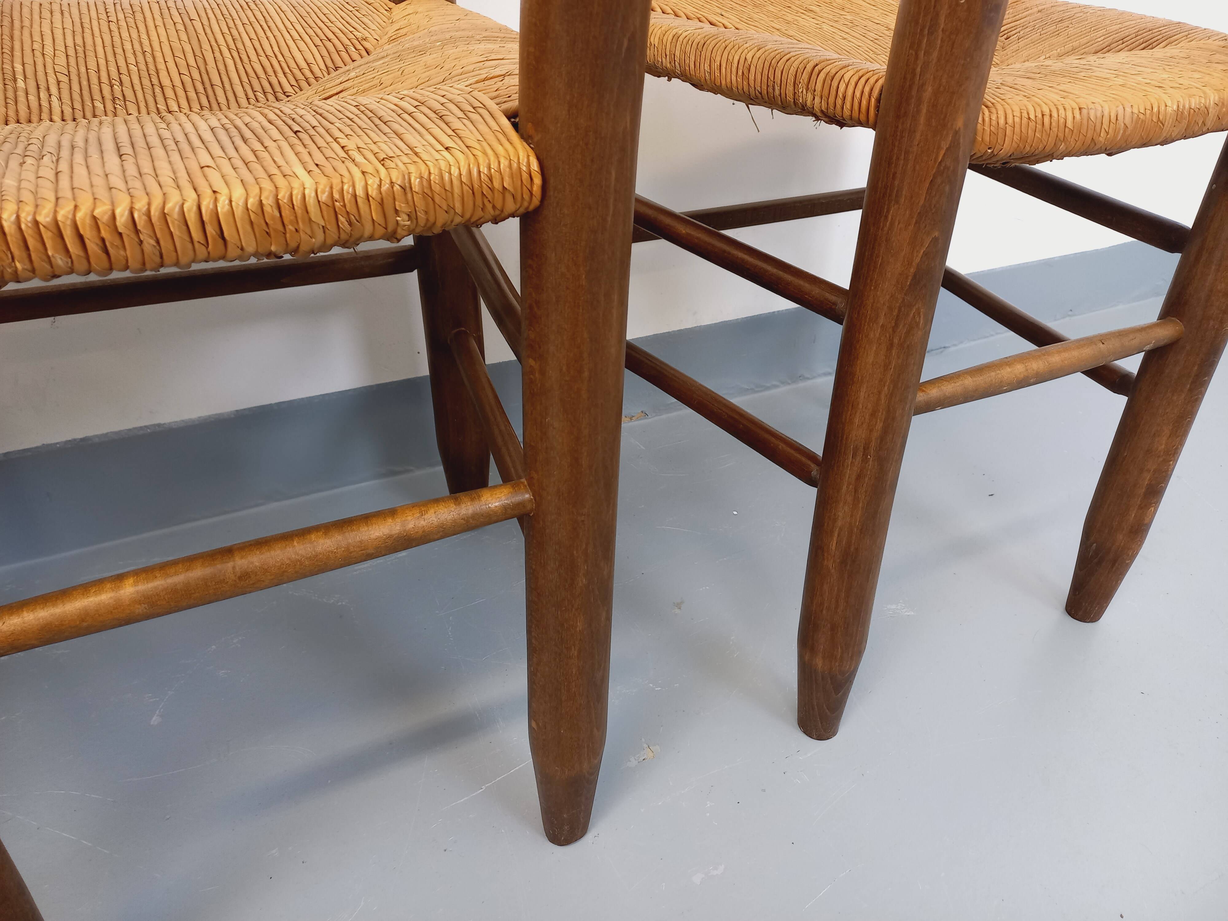 Set of 4 vintage brutalist chairs in wood and straw from the 1960s.