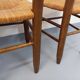 Set of 4 vintage brutalist chairs in wood and straw from the 1960s.