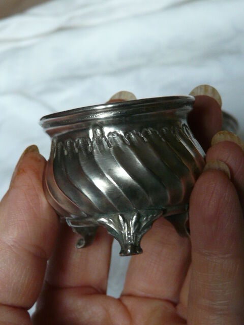 Pair of silver pepper shaker punch minerve
