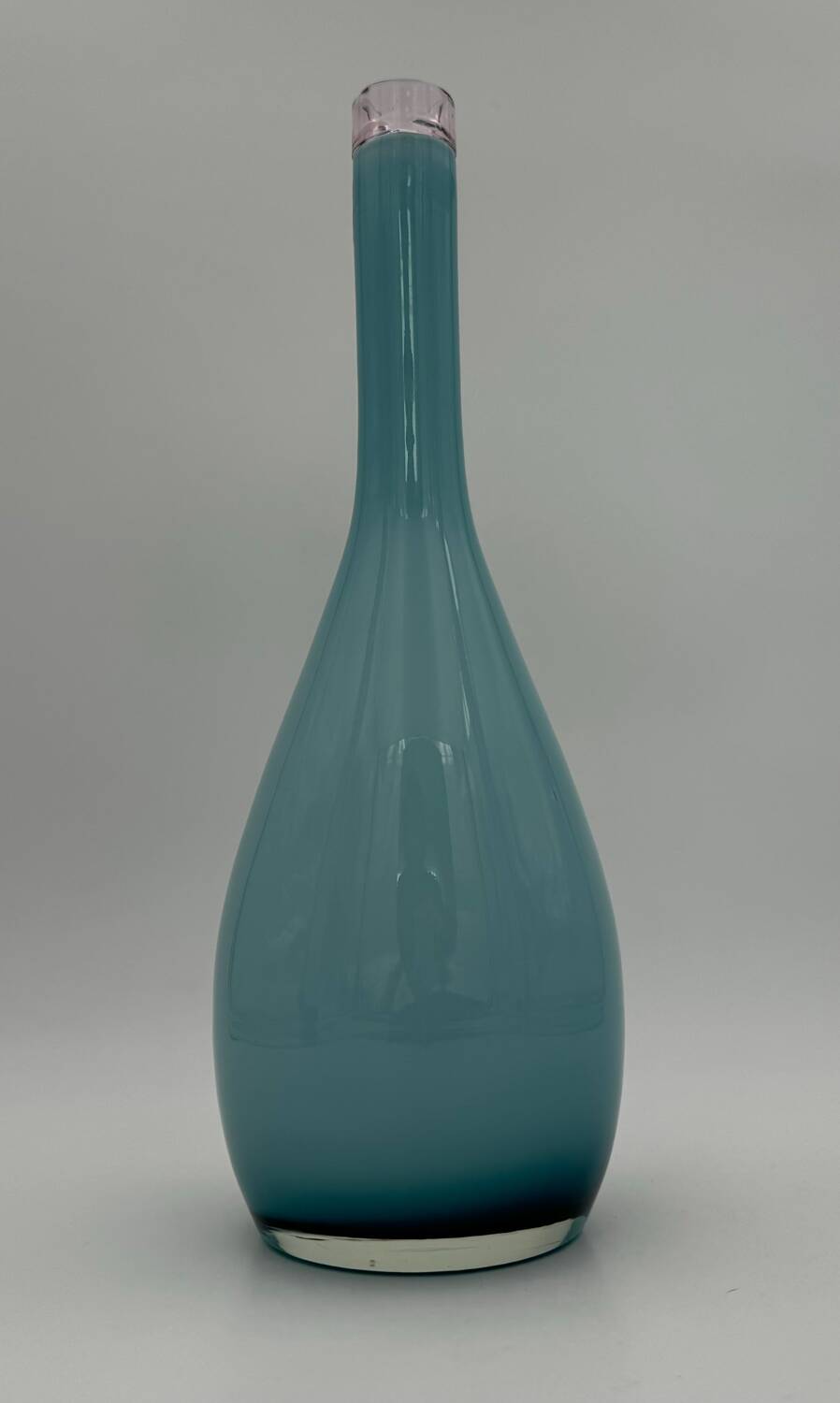 Blue lined glass bottle vase
