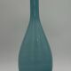 Blue lined glass bottle vase