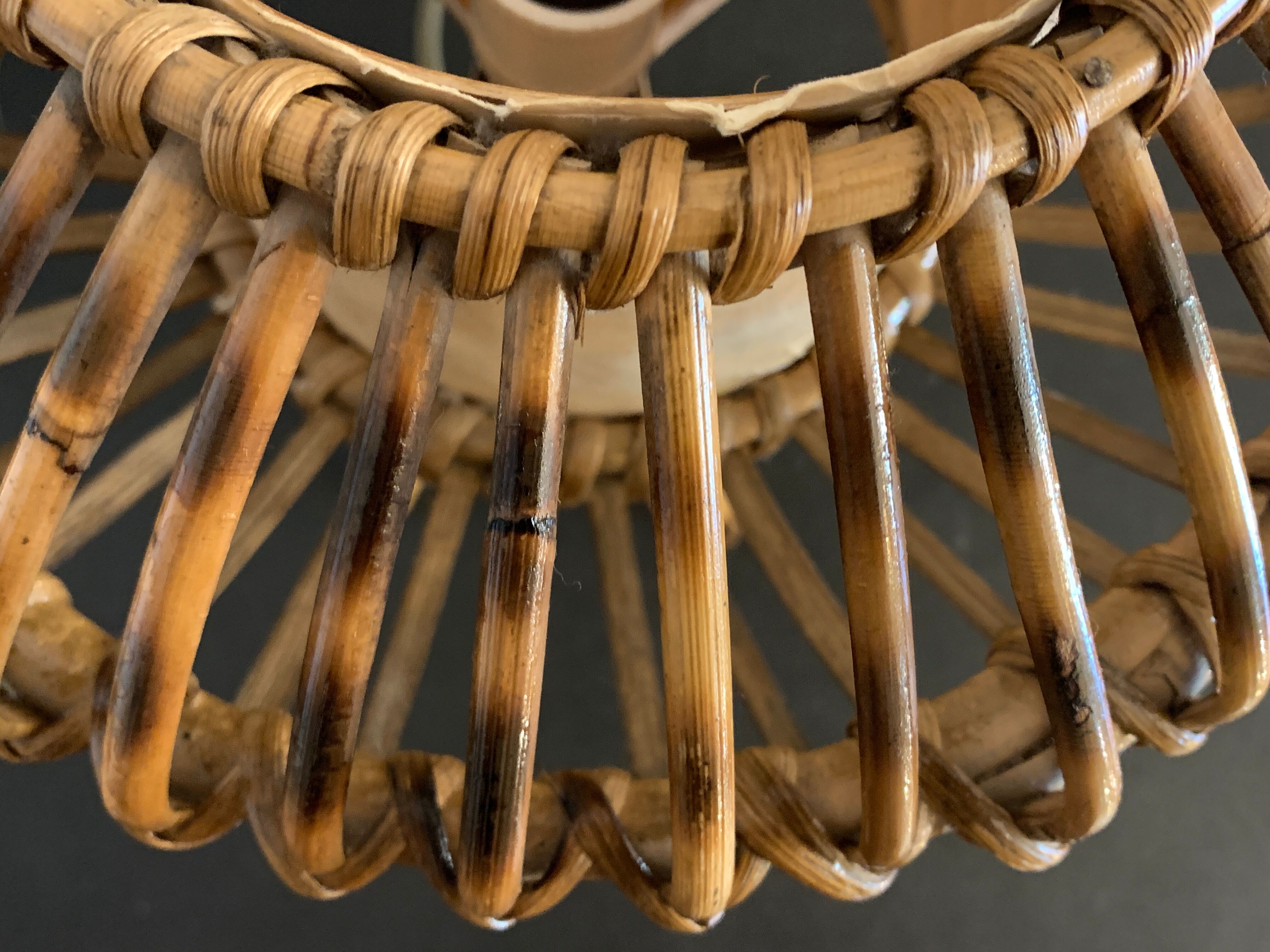 Rattan lamp in the shape of an ellipse Louis Sognot 1950