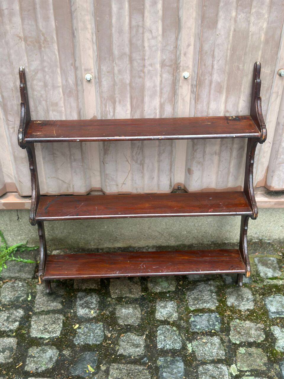 Vintage wall shelf made of dark solid wood from the 19th century.