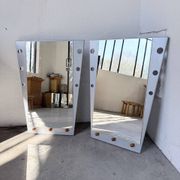 Pair of "Memphis" mirrors from the 80s in chrome and wood.