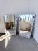 Pair of "Memphis" mirrors from the 80s in chrome and wood.