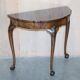 Console half-moon style Thomas Chippendale in flame mahogany.