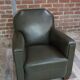 Fauteuil club art déco en skaï et bois