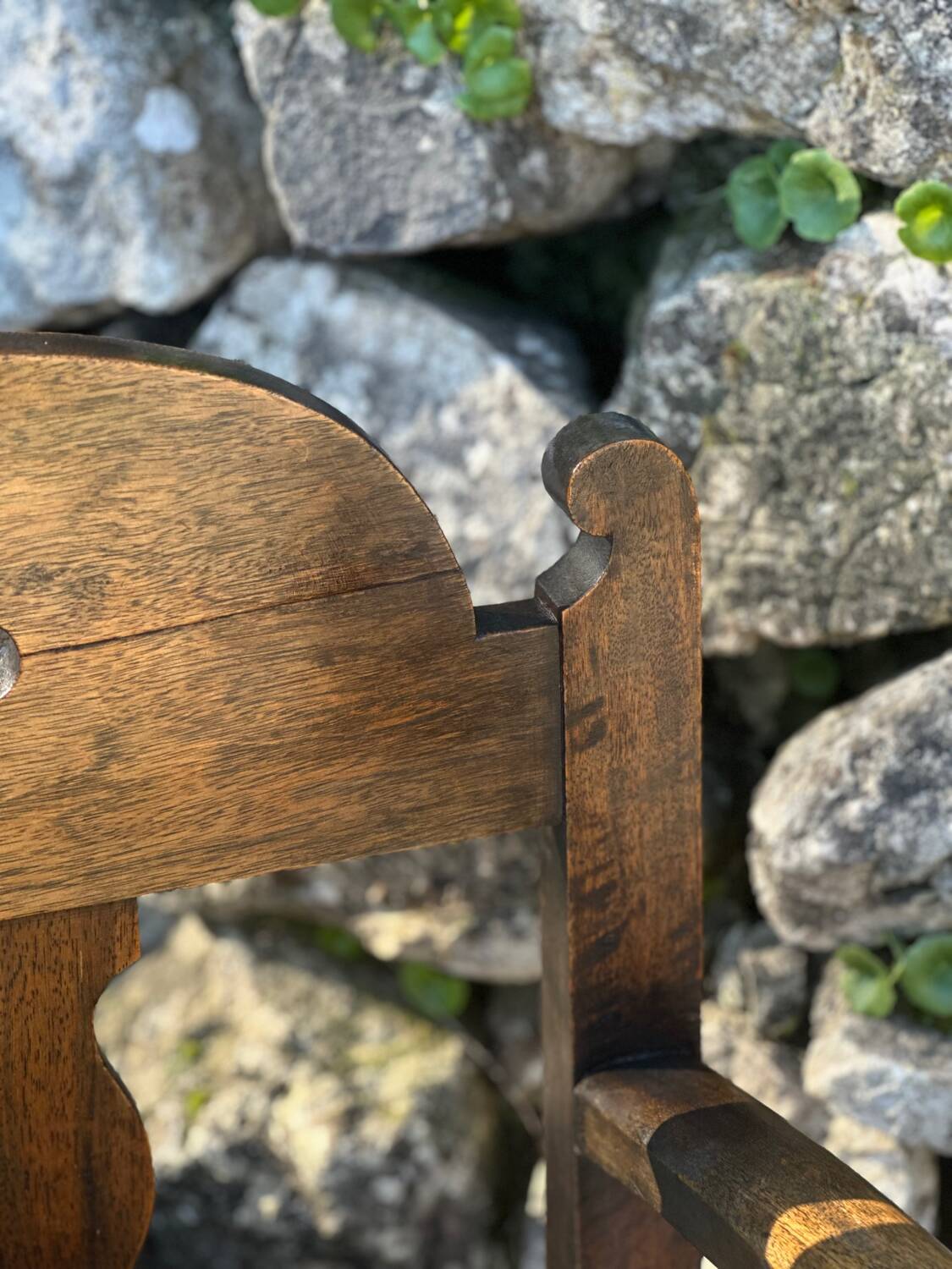 Pair of armchairs in stained wood and leather, 20th century