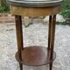 Ancient pedestal table with marble top