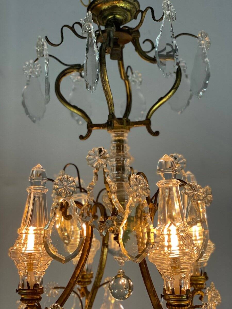 Bronze cage chandelier adorned with cut crystal pendants, 12 lights